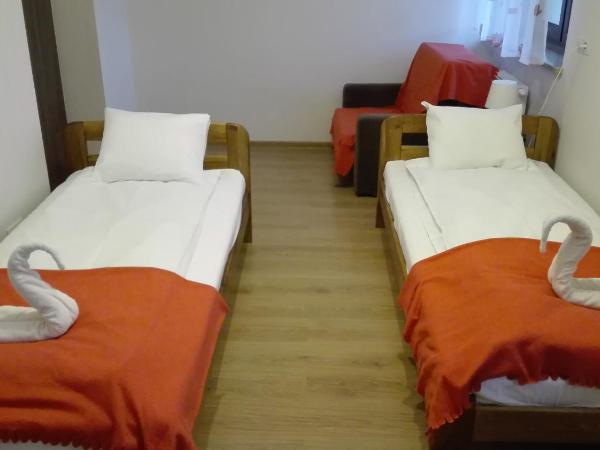 Willa Julia : photo 9 de la chambre chambre triple avec salle de bains privative