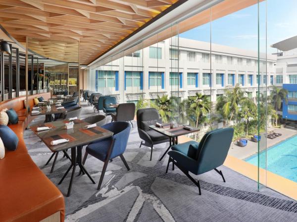 Novotel Jakarta Mangga Dua Square : photo 4 de la chambre chambre lits jumeaux deluxe - premier Étage