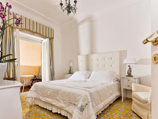 Sina Flora : photo 3 de la chambre chambre lit queen-size