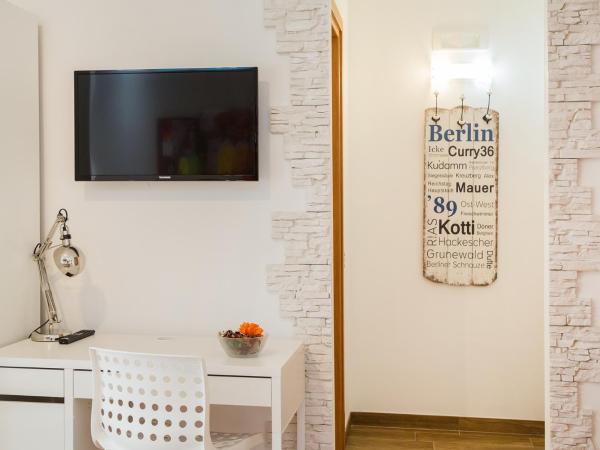 Donna Gina : photo 1 de la chambre grande chambre double