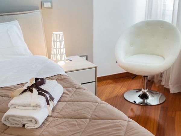 Donna Gina : photo 6 de la chambre grande chambre double