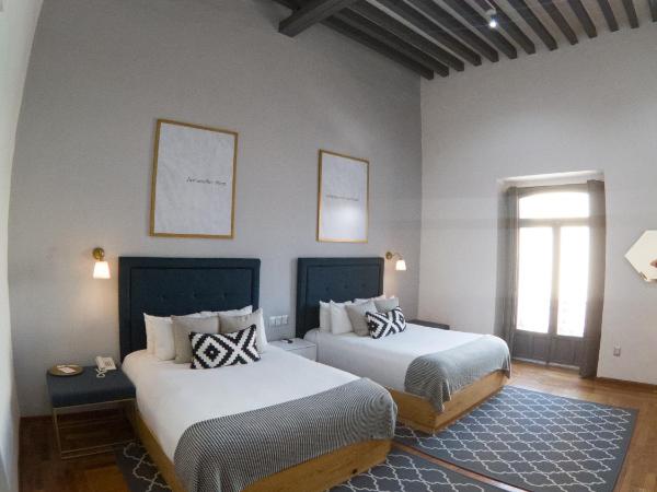 Markee Hotel Boutique : photo 7 de la chambre suite junior avec 2 lits doubles