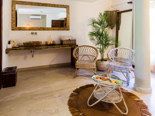 Ana y Jose Hotel & Beach Club Tulum : photo 6 de la chambre suite - vue sur jardin