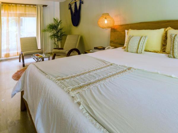 Ana y Jose Hotel & Beach Club Tulum : photo 7 de la chambre suite - vue sur jardin