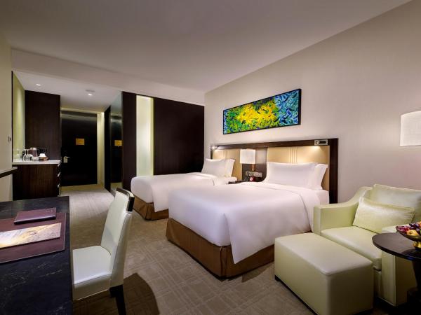 Pavilion Hotel Kuala Lumpur Managed by Banyan Tree : photo 1 de la chambre hébergement lits jumeaux - ville oasis