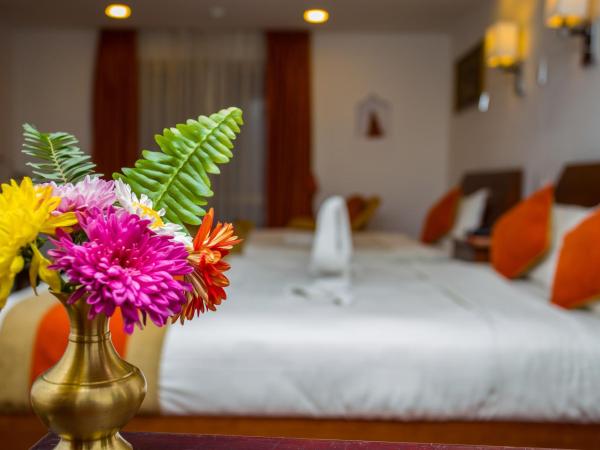 Apsara Boutique Hotel : photo 8 de la chambre chambre familiale de luxe avec vue sur jardin