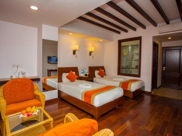 Apsara Boutique Hotel : photo 7 de la chambre chambre lits jumeaux deluxe avec vue sur le jardin