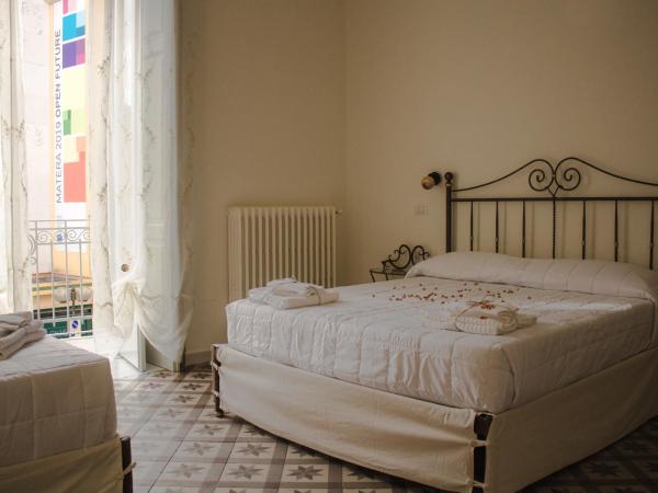 Pietre e Sassi : photo 1 de la chambre chambre quadruple avec salle de bains privative