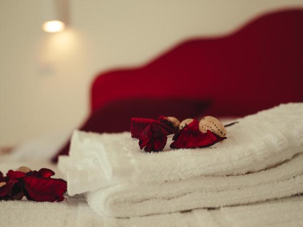 Pietre e Sassi : photo 5 de la chambre chambre triple avec salle de bains privative