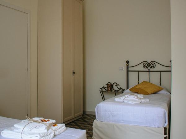 Pietre e Sassi : photo 6 de la chambre chambre quadruple avec salle de bains privative