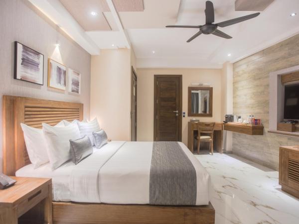 Samann Grand : photo 2 de la chambre suite exécutive avec balcon - navette aéroport aller-retour gratuite