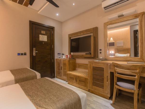 Samann Grand : photo 8 de la chambre hébergement double ou lits jumeaux deluxe avec balcon - vue sur océan (navette aéroport aller-retour gratuite)