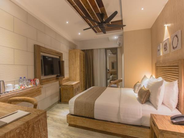 Samann Grand : photo 3 de la chambre hébergement double super deluxe avec balcon - vue sur océan (navette aéroport aller-retour gratuite)