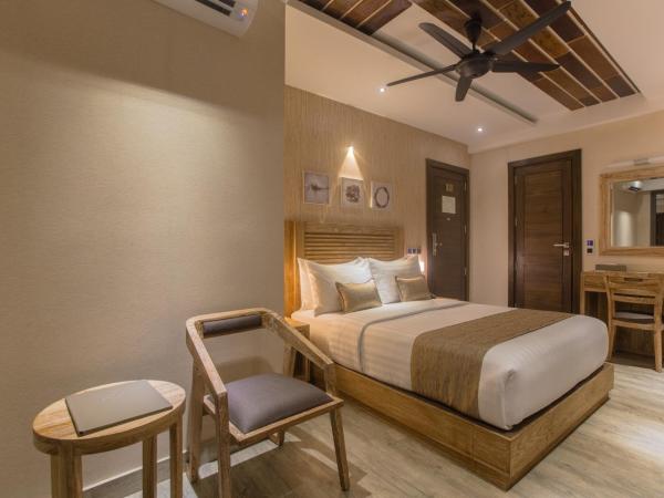 Samann Grand : photo 2 de la chambre hébergement double super deluxe avec balcon - vue sur océan (navette aéroport aller-retour gratuite)