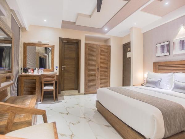 Samann Grand : photo 4 de la chambre suite exécutive avec balcon - navette aéroport aller-retour gratuite