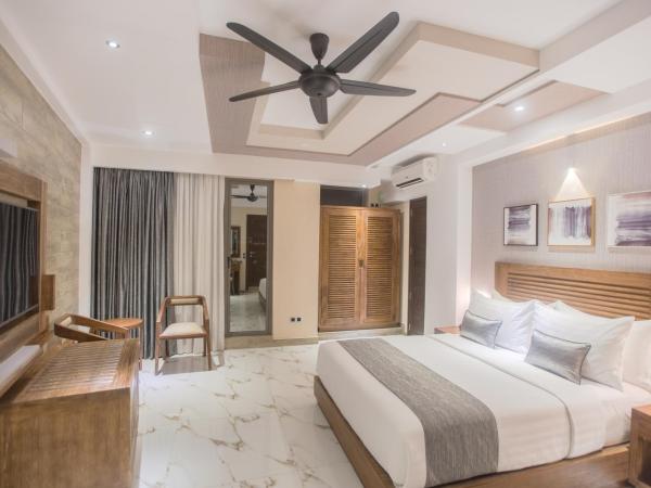 Samann Grand : photo 3 de la chambre suite exécutive avec balcon - navette aéroport aller-retour gratuite