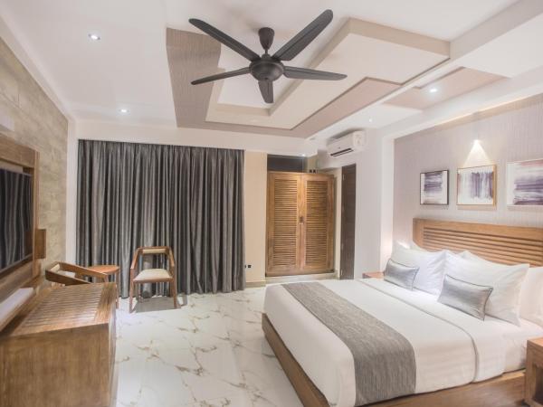 Samann Grand : photo 9 de la chambre suite exécutive avec balcon - navette aéroport aller-retour gratuite