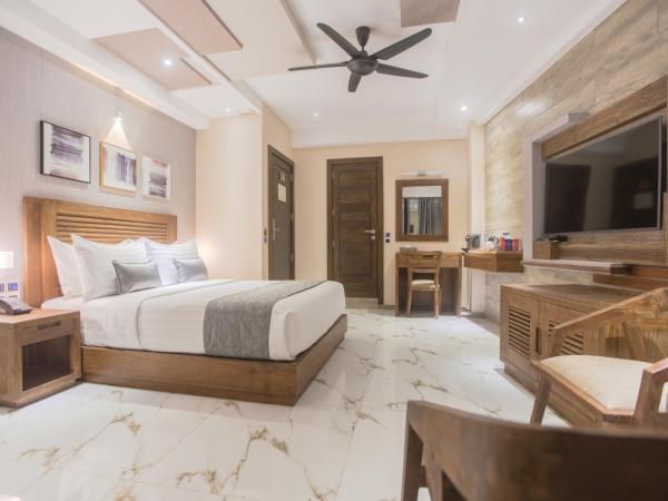 Samann Grand : photo 1 de la chambre suite exécutive avec balcon - navette aéroport aller-retour gratuite