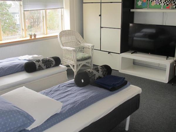 Guesthouse Sharon Aarhus : photo 4 de la chambre chambre double ou lits jumeaux avec salle de bains commune