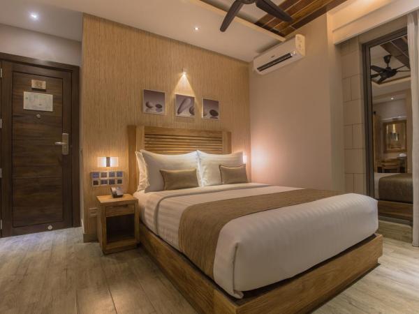 Samann Grand : photo 3 de la chambre hébergement double deluxe avec balcon - vue sur océan (navette aéroport aller-retour gratuite)