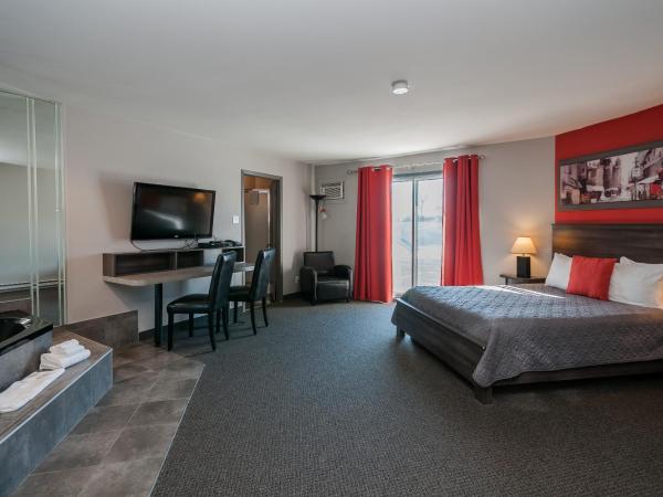 Hotel & Suites Monte-Cristo : photo 3 de la chambre suite lit queen-size