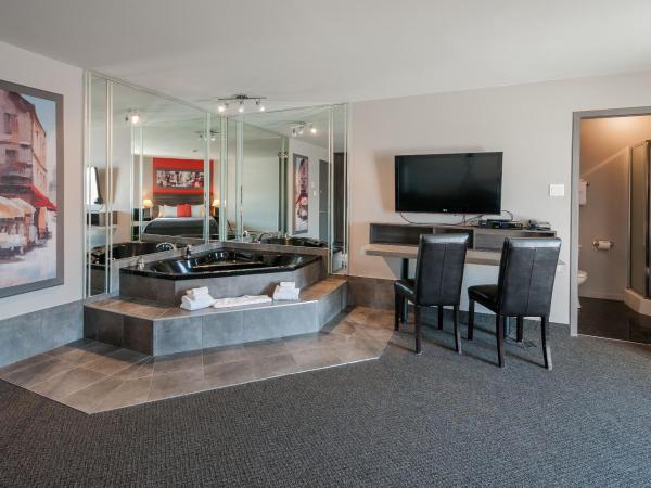 Hotel & Suites Monte-Cristo : photo 2 de la chambre suite lit queen-size