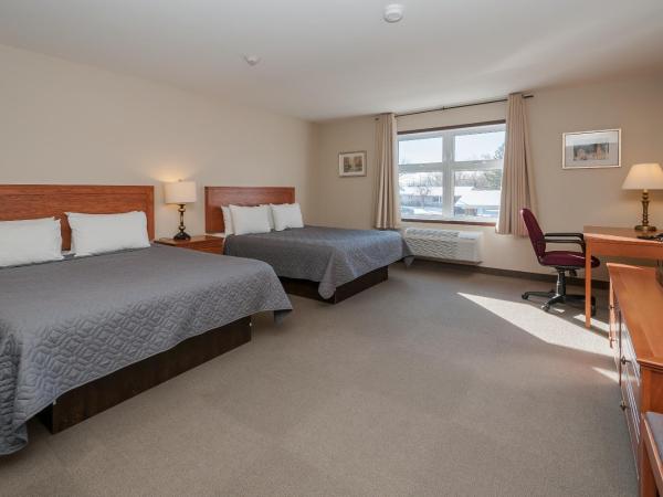 Hotel & Suites Monte-Cristo : photo 1 de la chambre chambre deluxe avec 2 lits queen-size