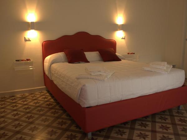 Pietre e Sassi : photo 9 de la chambre chambre triple avec salle de bains privative