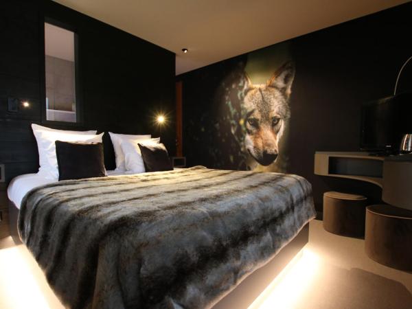 Les Loges Du Parc : photo 7 de la chambre chambre double deluxe avec baignoire spa - loup