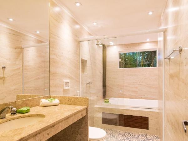 Pousada La Dolce Vita : photo 2 de la chambre suite de luxe avec baignoire spa