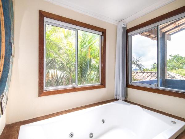 Pousada La Dolce Vita : photo 9 de la chambre suite de luxe avec baignoire spa
