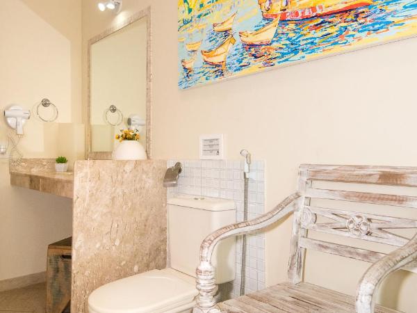 Pousada La Dolce Vita : photo 10 de la chambre suite de luxe avec baignoire spa