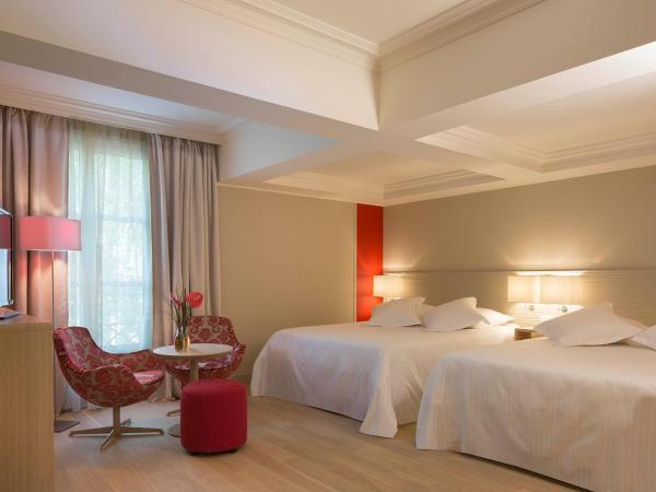 Hôtel & SPA Oceania L'Univers Tours : photo 2 de la chambre suite junior