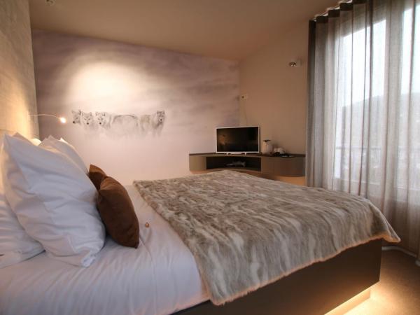 Les Loges Du Parc : photo 5 de la chambre chambre double deluxe avec baignoire spa - loup