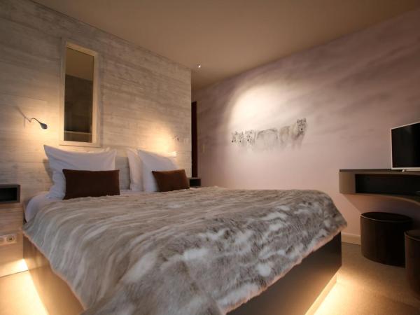 Les Loges Du Parc : photo 2 de la chambre chambre double deluxe avec baignoire spa - loup