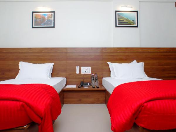 Little Mastiff Chinchwad by OTHPL : photo 2 de la chambre chambre lits jumeaux deluxe