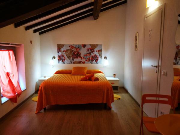 I Colori di Mag : photo 2 de la chambre chambre double avec salle de bains