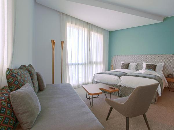 Kyriad Residence Casablanca : photo 1 de la chambre chambre supérieure avec 2 lits simples et 1 canapé-lit