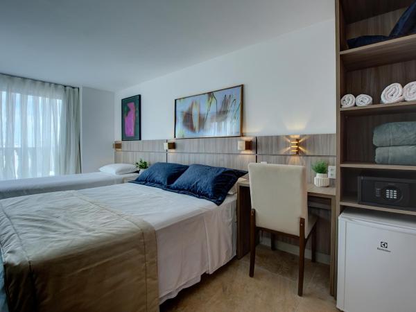 Hotel da Villa : photo 2 de la chambre chambre triple avec 1 lit double et 1 lit simple - vue sur mer