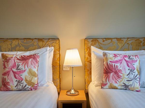 Antoinette Hotel Wimbledon : photo 4 de la chambre chambre lits jumeaux excutive avec 2 lits doubles