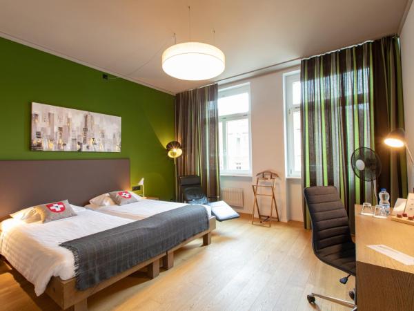 Hotel Bären am Bundesplatz : photo 3 de la chambre grande chambre double