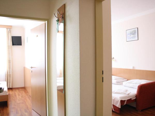 Hotel Zuglo : photo 1 de la chambre chambre triple
