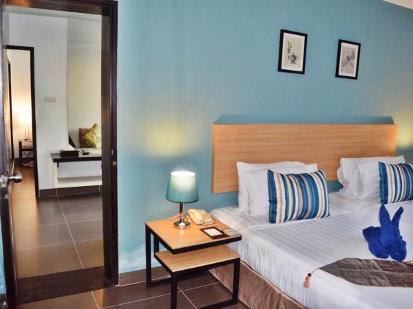 Vogue Pattaya Hotel : photo 4 de la chambre suite familiale