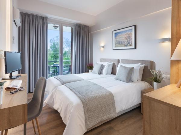 Minavra Hotel : photo 1 de la chambre chambre lits jumeaux