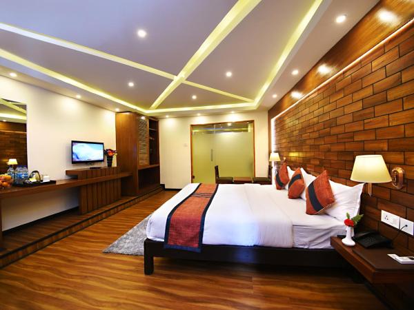 Hotel Jampa : photo 9 de la chambre suite lit king-size avec balcon - navette aéroport aller ou retour gratuite