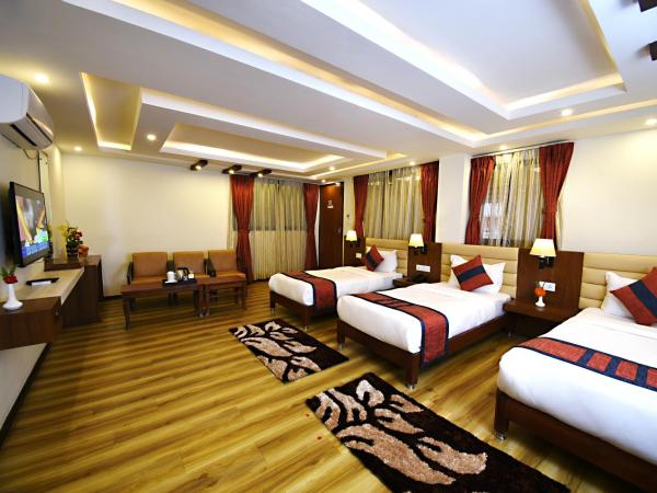 Hotel Jampa : photo 3 de la chambre chambre triple deluxe - navette aéroport aller ou retour gratuite