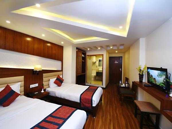 Hotel Jampa : photo 2 de la chambre chambre lits jumeaux avec balcon - navette aéroport aller ou retour gratuite