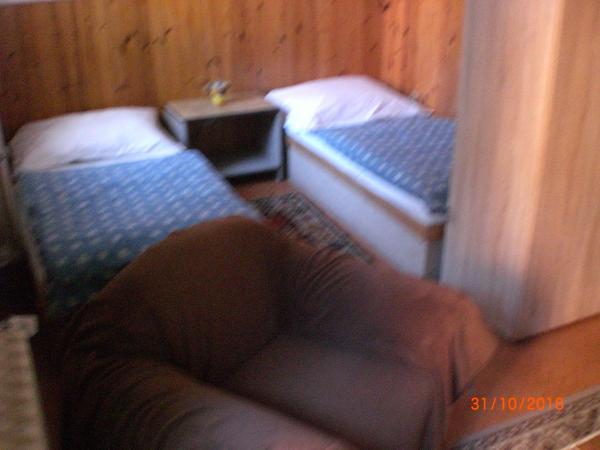 pension Kalik : photo 6 de la chambre chambre quadruple avec salle de bains privative