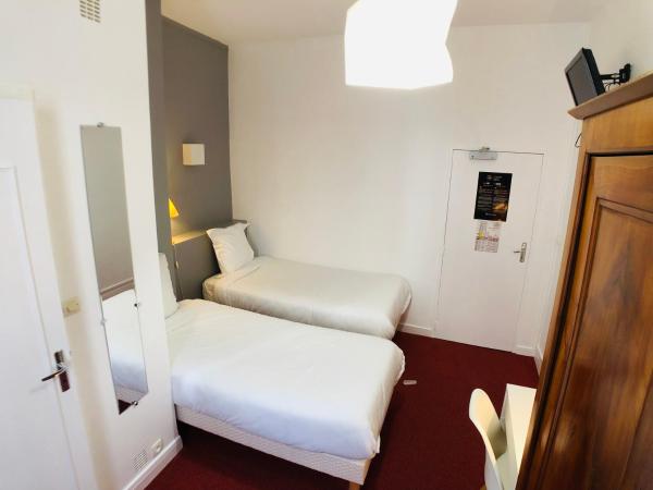 Cit'Hotel Le Volney : photo 3 de la chambre chambre lits jumeaux standard