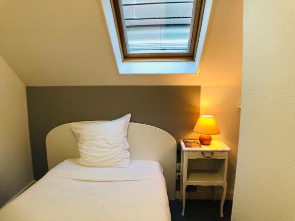 Cit'Hotel Le Volney : photo 2 de la chambre chambre simple